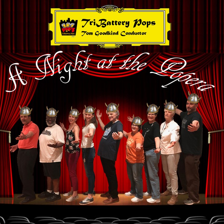 Cover image for album "A Night at the Popera" showing band members in viking hats on the opera stage